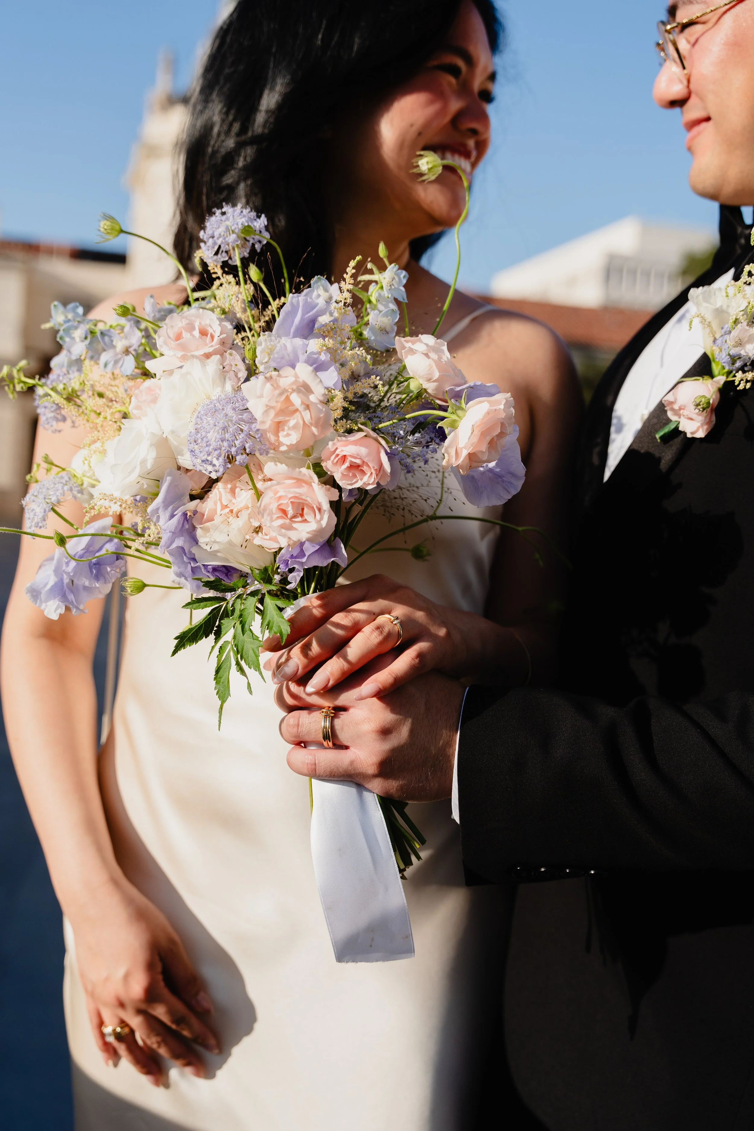 Close up of couple and bouquet at sunrise Pasadena City Hall Cakewalk elopement.