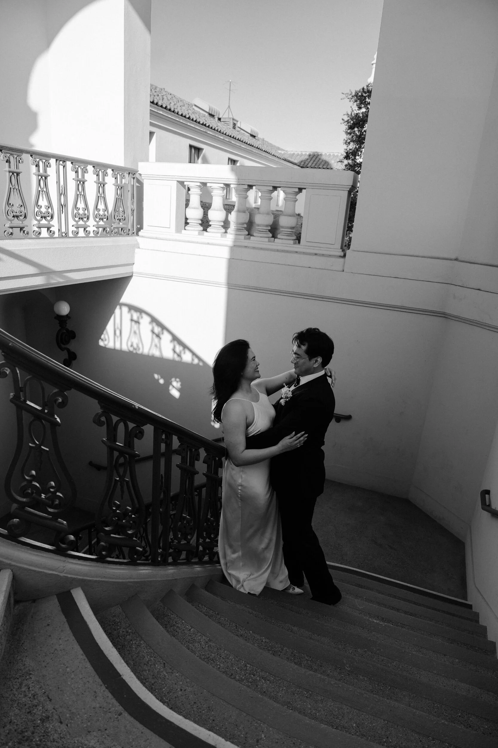 Bride and groom on the Pasadena City Hall staircase after their morning ceremony.