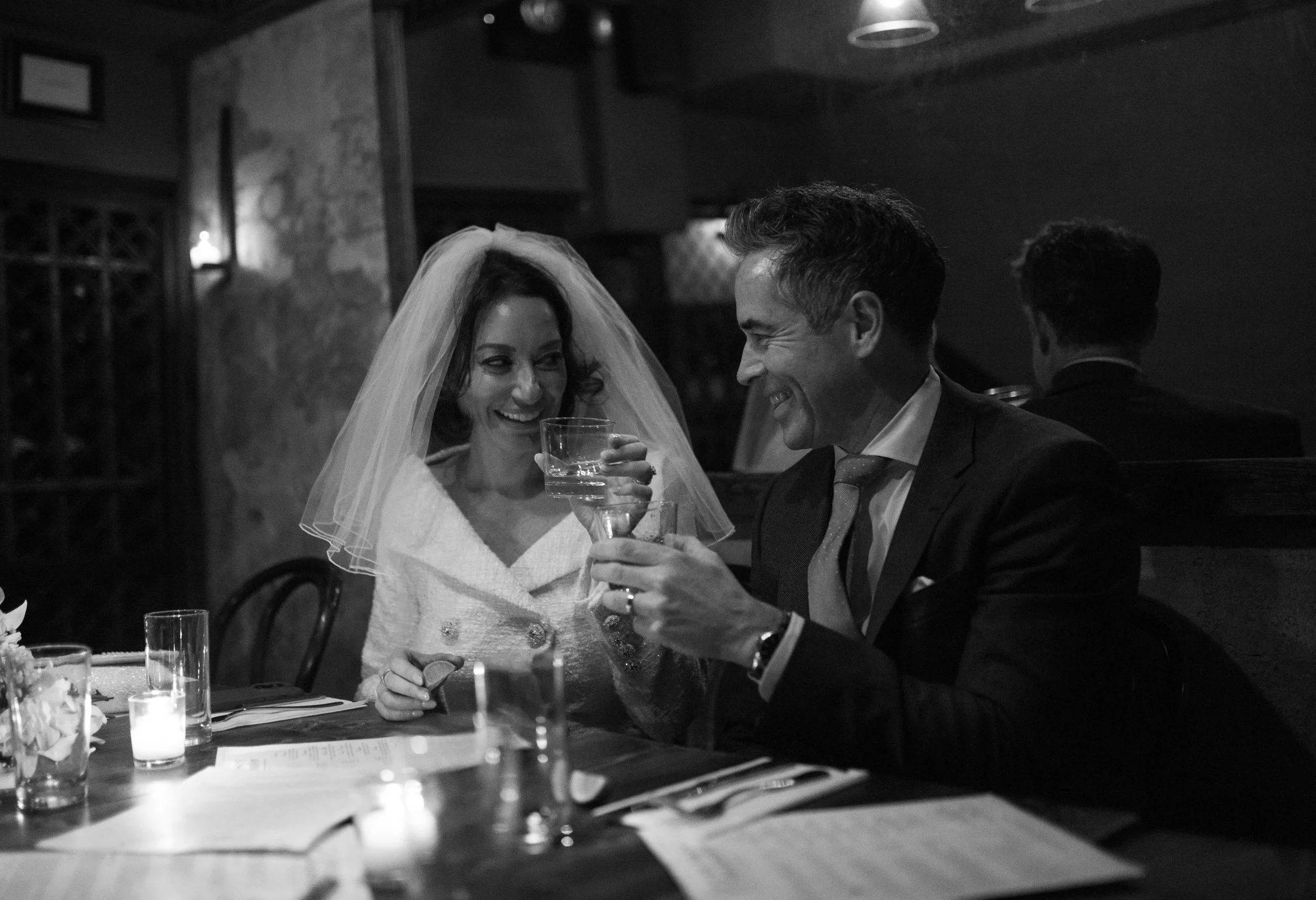 Documentary-style photo of a couple getting married in New York City during their Cakewalk elopement.