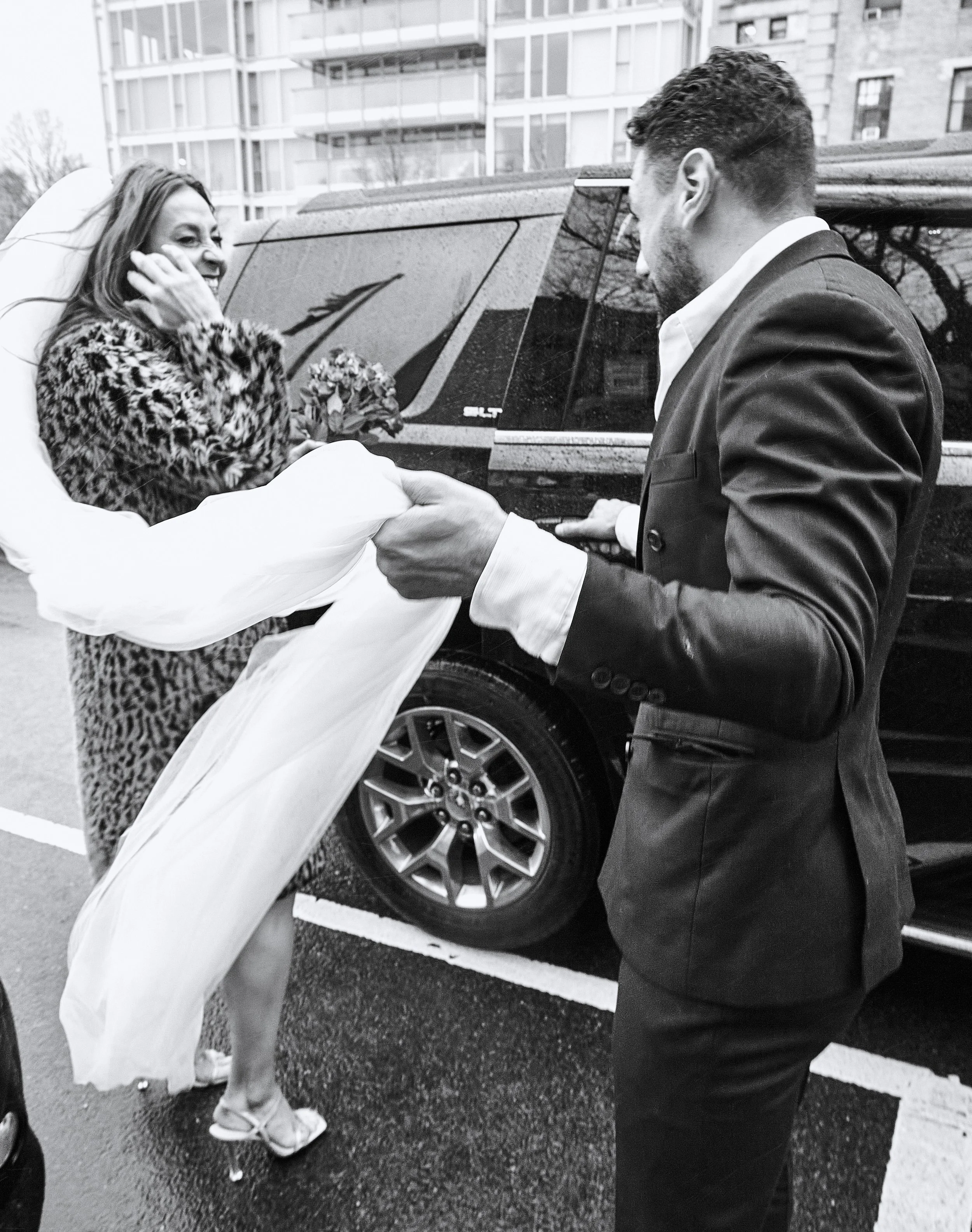 Bride and groom entering a car after their Cakewalk elopement in Brooklyn.