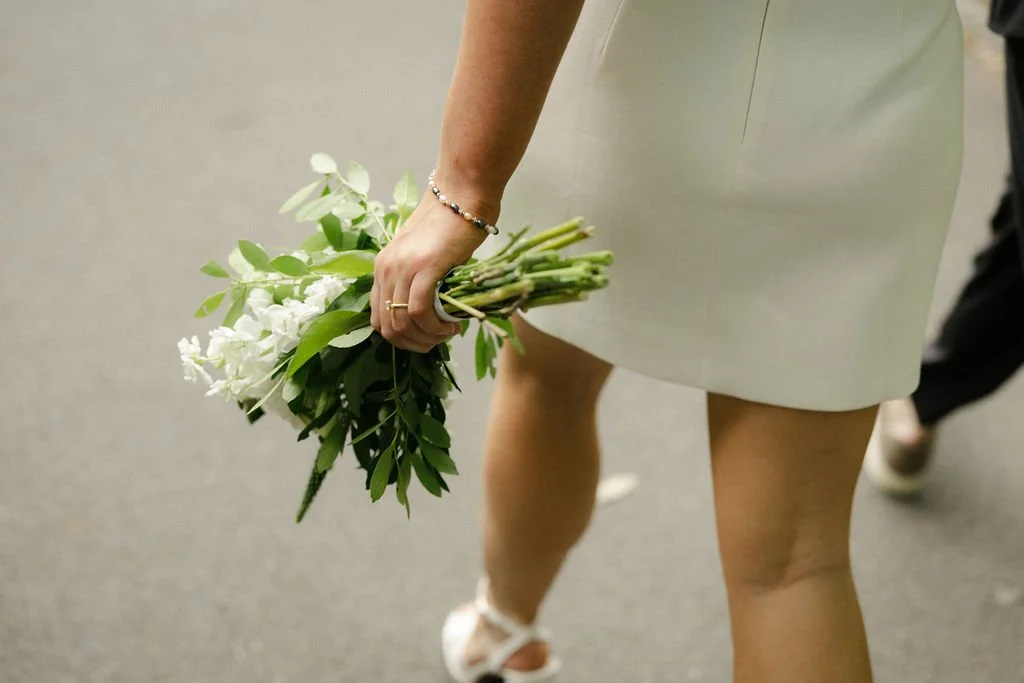 Close-up of Chloe's white bouquet during her Wagner Cove elopement at Central Park.