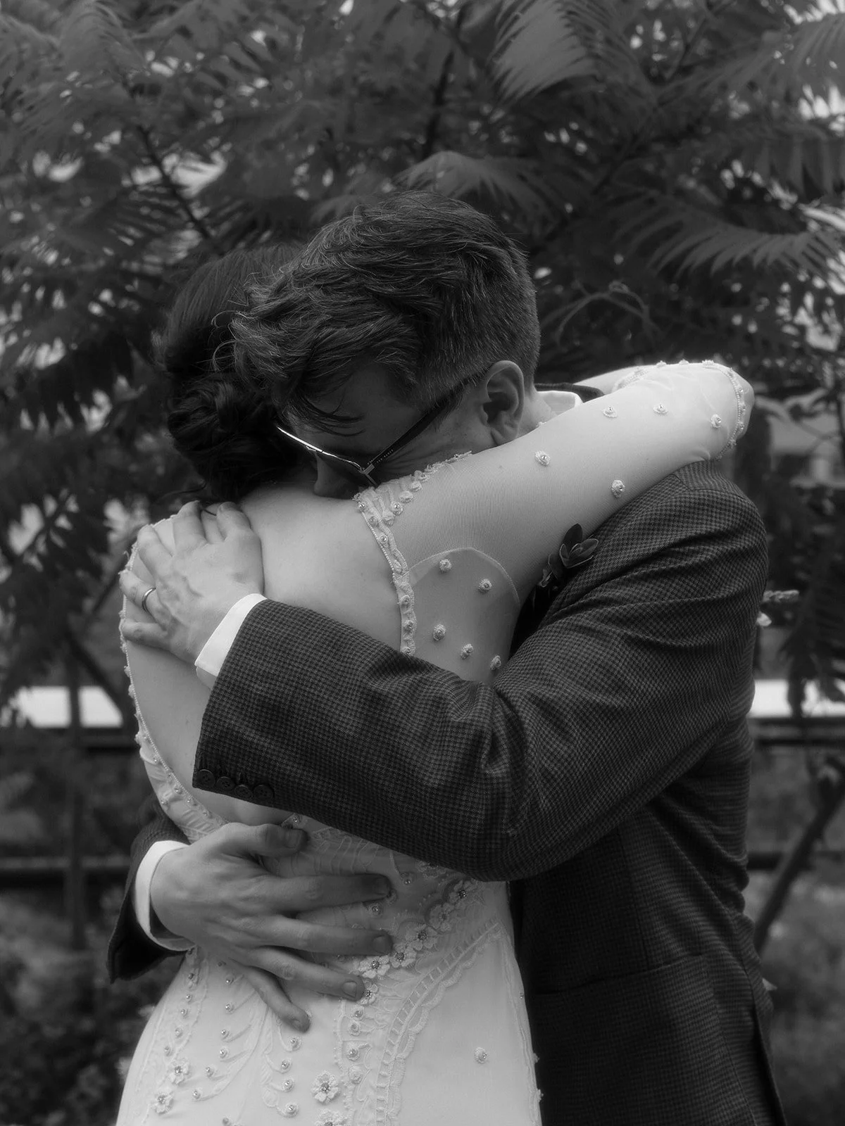 Bride and groom embracing after their Cakewalk elopement ceremony on New York's High Line.