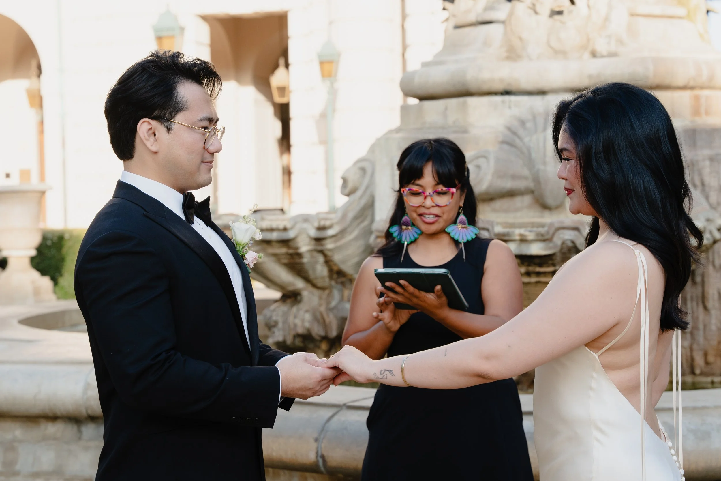 Couple's wedding ceremony at Pasadena City Hall organized by Cakewalk elopements.