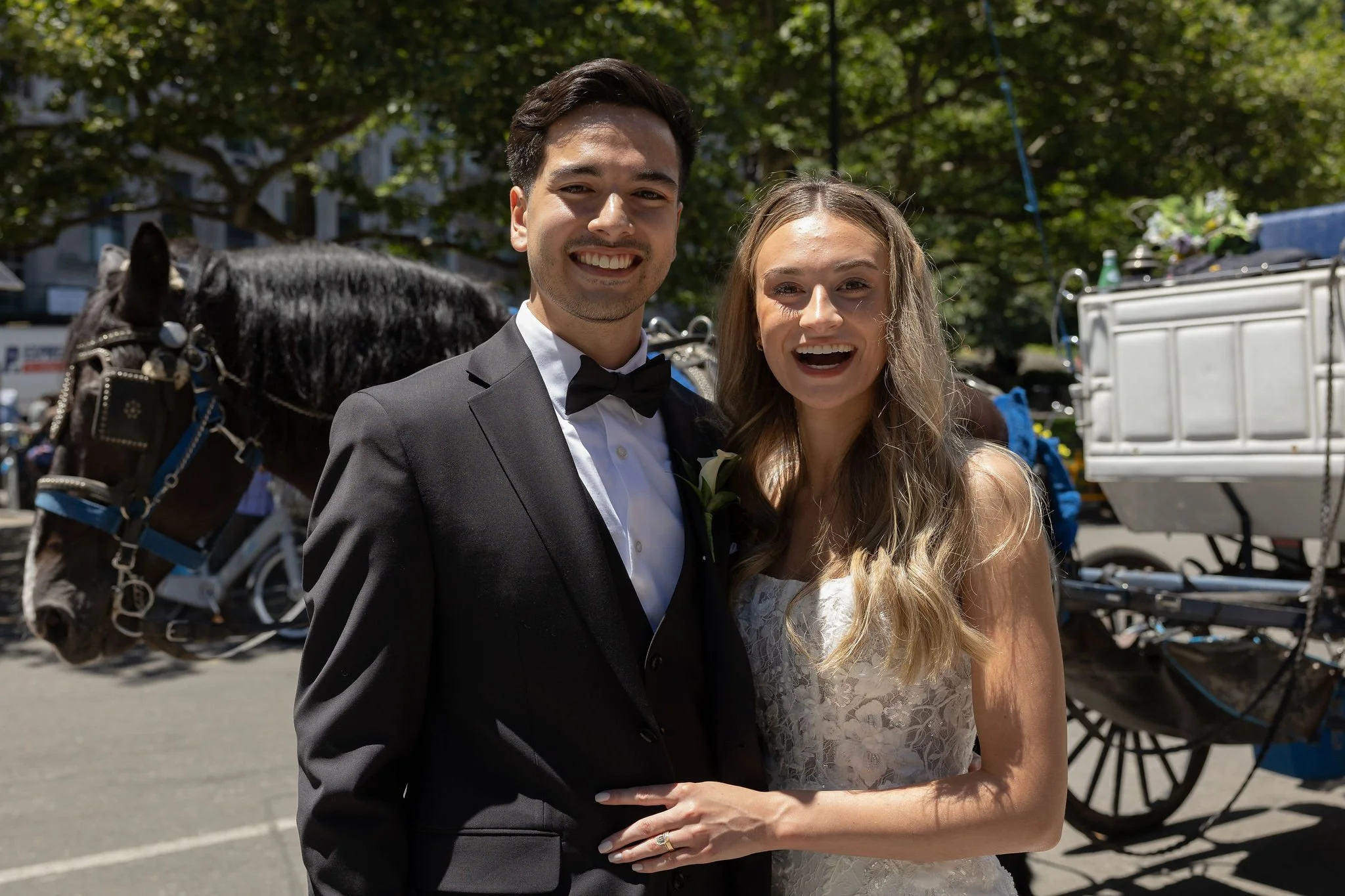Bride and groom being married by female Cakewalk officiant at Cop Cot micro wedding in Central Park.