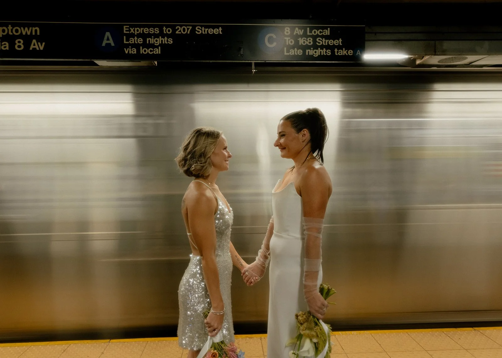 LGBT Australian Couple takes documentary style photos in the subway after their wedding ceremony with Cakewalk.
