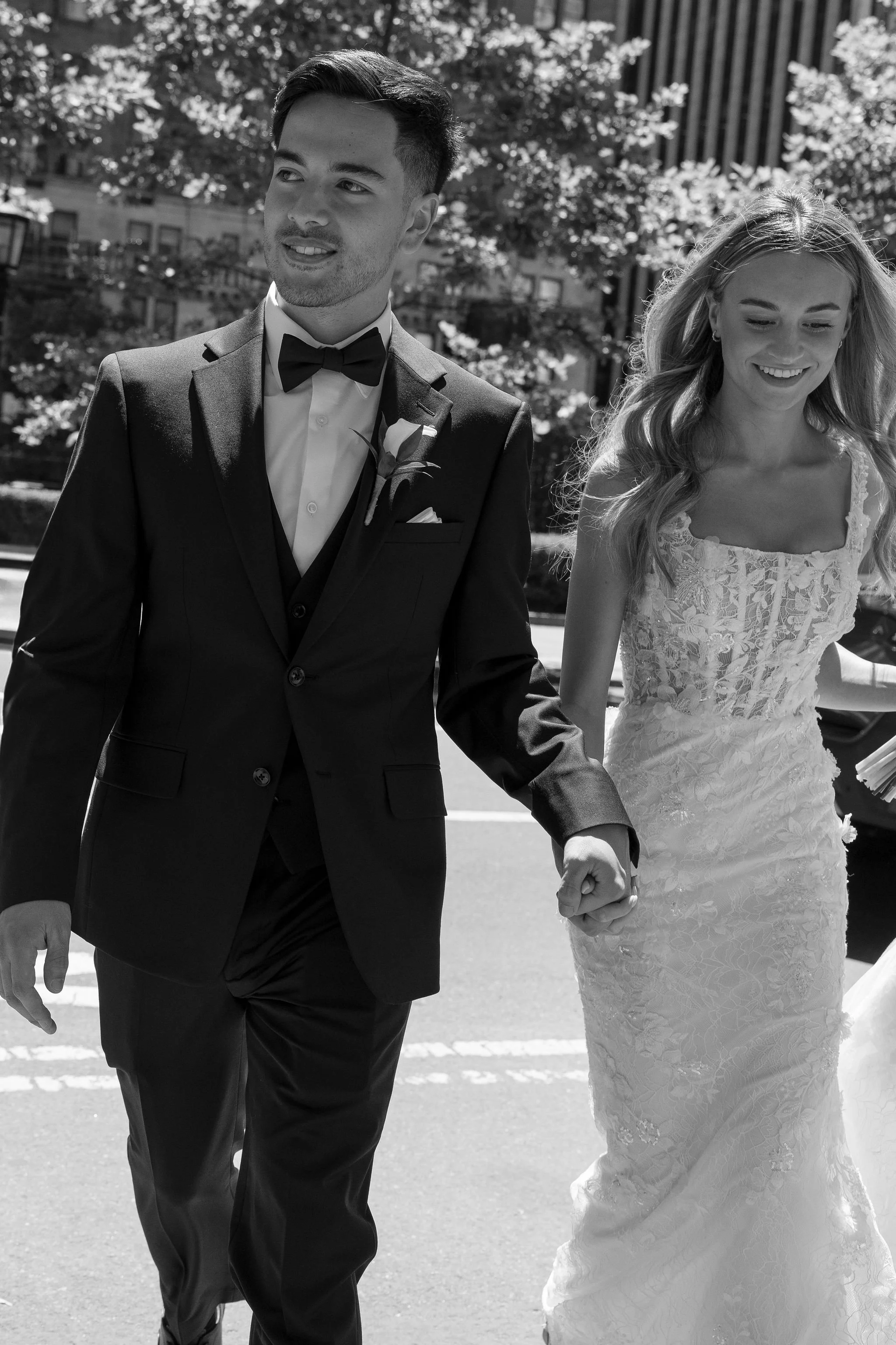 Bride and groom walking to Central Park in Manhattan for their Cakewalk micro wedding.