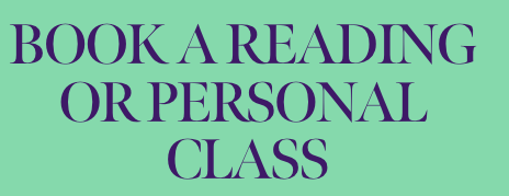 Sign with purple text on a green background that reads 'Book a reading or personal class.'