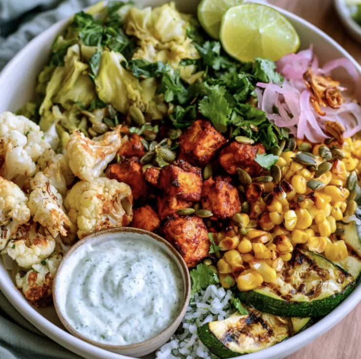 For Pros: Chorizo Vitality Bowl with Chorizo Tofu, Cilantro Lime Rice, Braised Green Cabbage, Cauliflower, Zucchini, Charred Corn, Cilantro, Pepitas, Pickled Shallots, Lime, Cilantro Lime Tahini