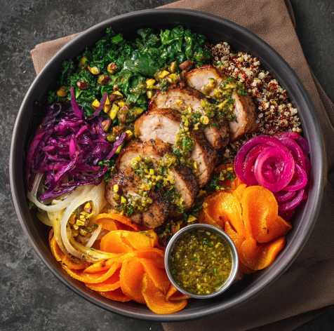 For Pros: Citrus Vitality Bowl with Citrus–Herb Pork Tenderloin, Red Quinoa, Cabbage, Carrots, Leeks, Spinach, Pistachios, Pickled Red Onion, Parsley, Garlic-Infused Chimichurri