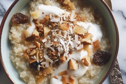 Pro: Quinoa Porridge with Coconut Milk, Greek Yogurt, Coconut Shavings and Raisins
