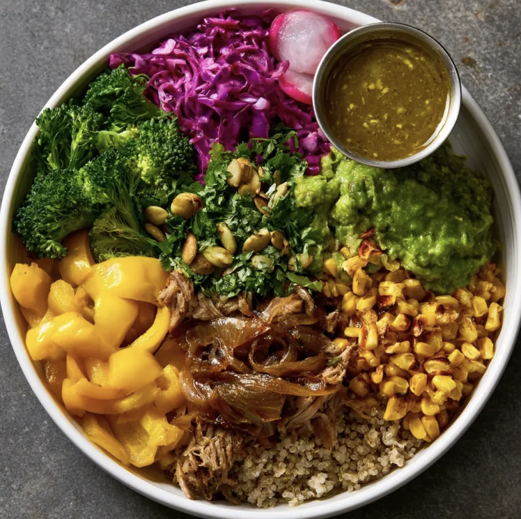 For Pros: Oaxacan Strength Bowl with Mexican Pork Chile Verde, Quinoa, Bell Peppers, Broccoli, Caramelized Onions, Roasted Corn, Cabbage Slaw, Cilantro, Pumpkin Seeds, Pickled Radish, Salsa Verde