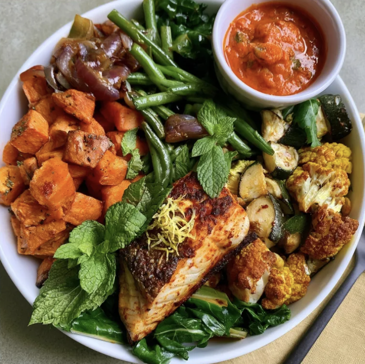 For Pros: Moroccan Nourish Bowl with Mild Harissa Barramundi, Sweet Potato, Turmeric Cauliflower, Zucchini, Caramelized Onion, Green Beans, Swiss Chard, Mint, Lemon, Roasted Red Pepper Harissa Sauce