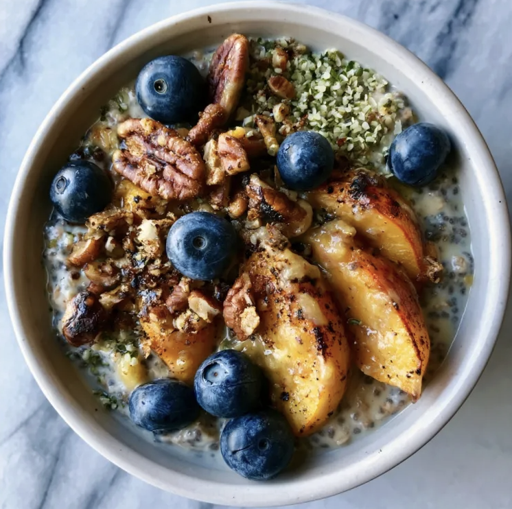 For Pros: Peach Cobbler Chia Overnight Oats with Roasted Summer Peaches, Chia Oats, Fresh Blueberries, Toasted Pecans, Hemp Seeds and Peach Compote