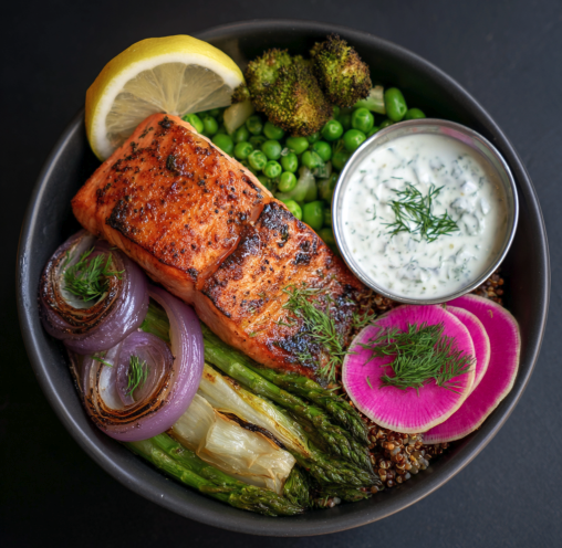 For Students: Omega Renewal Bowl with Seared Salmon, Steamed Asparagus, Fennel, Peas, Broccoli, Roasted Onion, Sorghum, a Lemon–Dill Yogurt Sauce, Parsley and Watermelon Radish