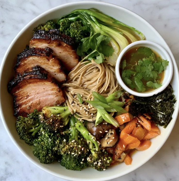For Pros: Kyoto Ramen Bowl with Miso Marinated Pork, Brown Rice Ramen Noodles, Sesame Broccoli, Bok Choy, Carrots, Mushroom, Dried Seaweed, Scallion, Sesame Seed, Cilantro, Miso Garlic Dashi Broth