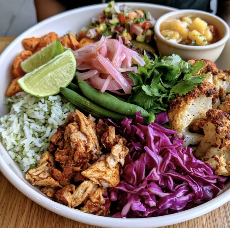 For Pros: Chipotle Glow Bowl with Shredded Chicken Tinga, Cilantro Lime Rice, Roasted Spiced Cauliflower, Red Cabbage, Green Bean, Cilantro, Pickled Shallot, Lime, Chipotle Pineapple Salsa