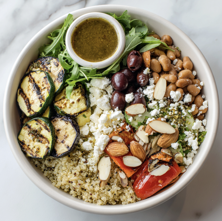 For Pros: Mediterranean Glow Bowl with Mixed Beans, Quinoa, Grilled Zucchini, Eggplant, Raw Tomato, Arugula, Olives, Almonds, Feta, Oregano Vinaigrette