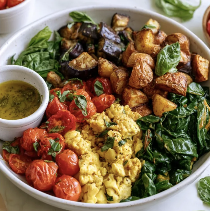 For Pros: Garden Breakfast Bowl with Tomato Basil Egg Scramble, Roasted Potatoes, Braised Swiss Chard, Eggplant, Roasted Cherry Tomatoes, Basil, Basil Dijon Vinaigrette