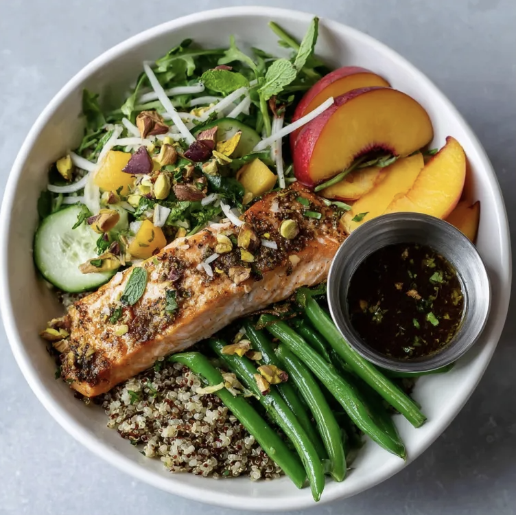 For Pros: Golden Peach Salad with Citrus Peach Salmon, Quinoa, Arugula, Cucumber, Fennel, Green Beans, Peach, Mint, Pickled Shallots, Pistachios, Peach Champagne Vinaigrette