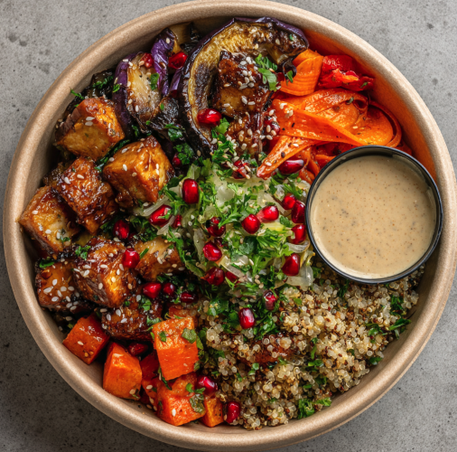 Protein Vitality Bowl with Sesame Cumin Tofu, Quinoa, Roasted Eggplant, Steamed Carrots, Roasted Fennel, Green Onion, Pomgranate, Parsley, Smoky Tahini Sauce