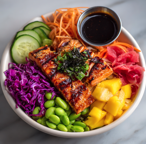 For Orca: Poke Bowl with Salmon, Red Cabbage, Shredded Carrots, Cucumber, Edamame, Shiitake Mushrooms, Watermelon Radish, Mango, Hijiki and a Tamari Ginger dressing
