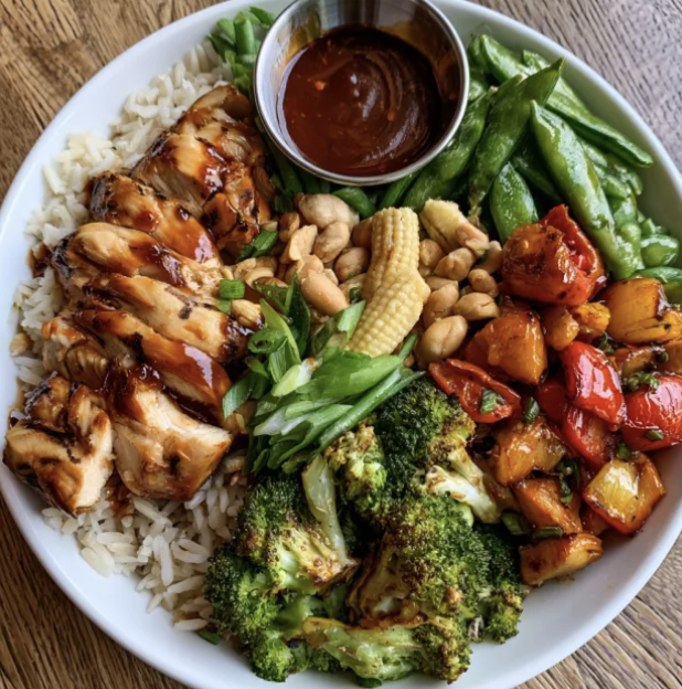 For Pros: Ginger Power Bowl with Kung Pao Chicken, Basmati Rice, Broccoli, Snap Peas, Peppers, Baby Corn, Scallions, Peanuts, Kung Pao Glaze