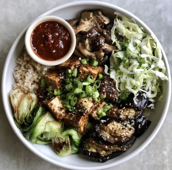 For Pros: Sichuan Metabolism Bowl with Mapo Tofu, Brown Rice, Bok Choy, Napa Cabbage, Shiitake Mushrooms, Chinese Eggplant, Scallions, Sesame Seeds, Mapo Sauce