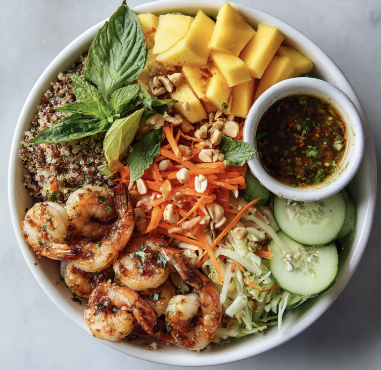 For Pros: Antioxidant Thai Bowl with Chili Lime Shrimp, Quinoa, Green Papaya, Cucumber, Carrot, Shredded Cabbage, Peanuts, Mango, Thai Basil, Som Tam Style Lime Dressing