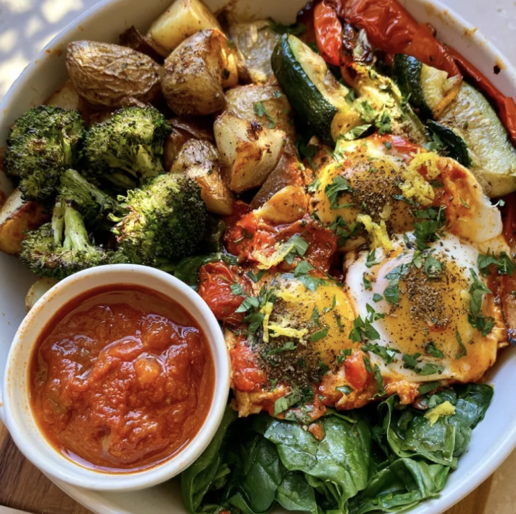 For Pros: Breakfast Shakshuka Bowl with Red Shakshuka Eggs, Roasted Potatoes, Broccoli, Eggplant, Spinach, Parsley, Za'atar, Lemon Zest, Red Shakshuka Sauce