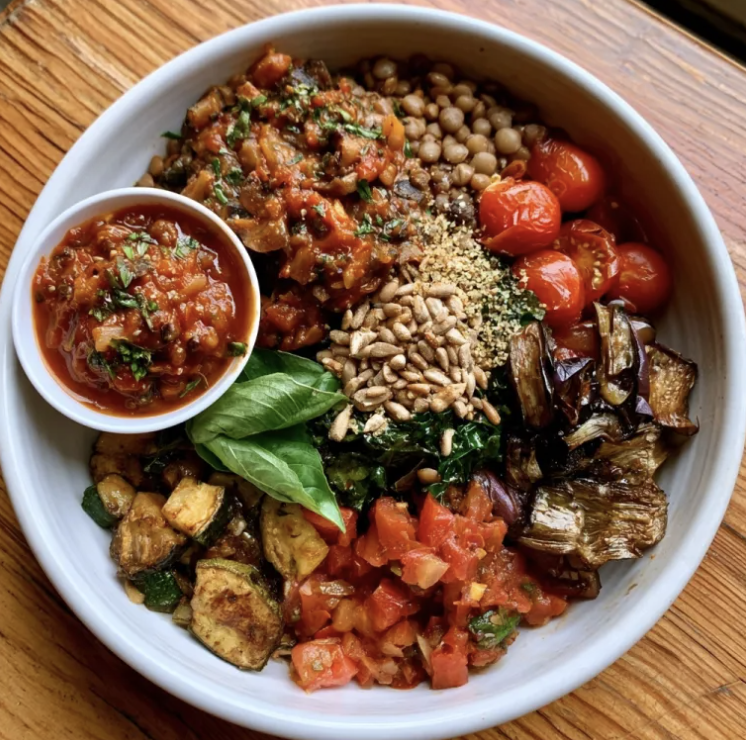 For Pros: Fiber Ragù Bowl with Lentil Mushroom Ragù, Lentils, Braised Kale, Tomatoes, Sautéed Zucchini, Eggplant, Basil, Sunflower Seeds, Nutritional Yeast, Rustic Mushroom Tomato Ragù