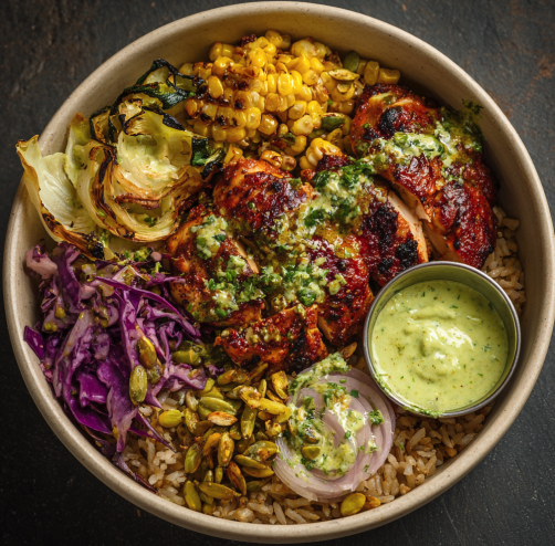 For Pros: Smoky Citrus Bowl with Ancho Chicken, Citrus Herb Brown Rice, Roasted Zucchini, Charred Corn, Cabbage, Pepitas, Cilantro, Pickled Shallots, Ancho Avocado Sauce