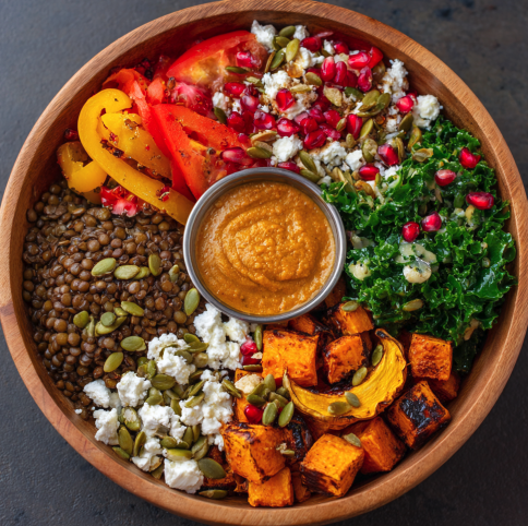 For Pros: Fiber Bowl with Lentil Salad, Sweet Potato, Tomato, Delicata Squash, Peppers, Kale, Carrot Puree, Pepitas, Goat Cheese, Pomegranate, Carolina Pepper Sauce