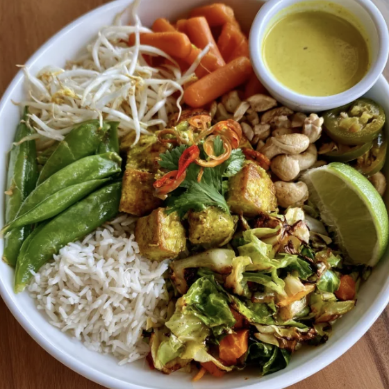 Thai Anti-Inflammatory Bowl with Thai Green Curry Tofu, Basmati Rice, Cabbage, Snap Pea, Carrot, Bean Sprout, Cashew, Pickled Thai Chili, Lime, Coconut Curry Sauce
