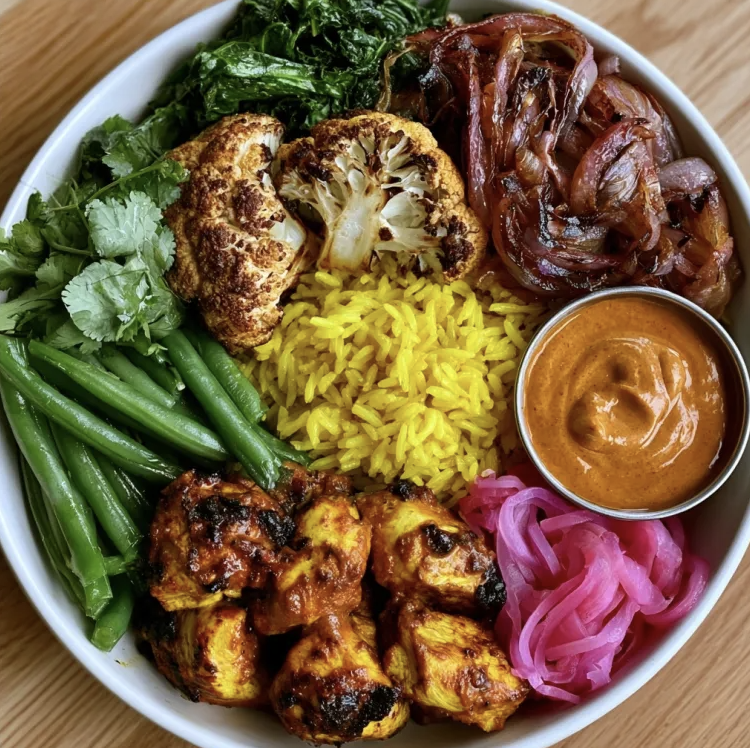 For Pros: Golden Anti-Inflammatory Bowl with Chicken Tikka Masala, Turmeric Basmati Rice, Caramelized Onions, Green Beans, Cauliflower, Kale, Pickled Onion, Cilantro, Cashew Tikka Masala Sauce