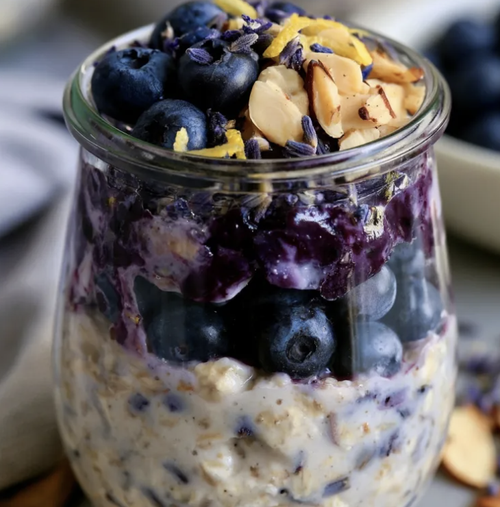 Blueberry Lavender Overnight Oats with Fresh Blueberries, Blueberry Compote, Lavender, Lemon Zest, Vanilla, Toasted Almonds