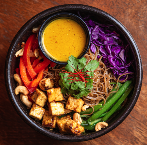 For Orca: Singaporean Noodle Bowl with Tamari Tofu, Brown Rice Noodles, Red Cabbage, Bell Peppers, Celery, Green Beans, Singapore-Style Curry Sauce, Fresh Cilantro, Chili Threads, Cashews