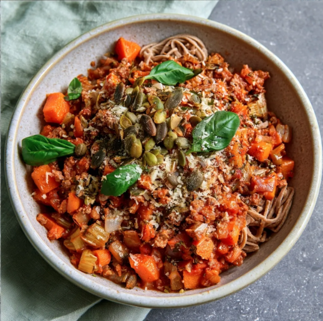 For Pros: Bolognese Bowl with Italian Herb Ground Beef, Brown Rice Noodles, Roasted Carrots, Roasted Celery, Roasted Onions, Basil, Pumpkin Seed, Parm, Rustic Tomato Herb Sauce