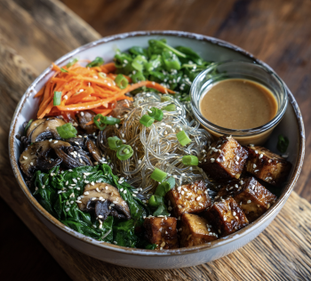 Sesame Balance Bowl with Sesame Tamari Tofu, Japchae Glass Noodles, Spinach, Shiitake Mushrooms, Carrot, Green Bell Pepper, Green Onion, Sesame Seeds, Sesame Tamari Sauce