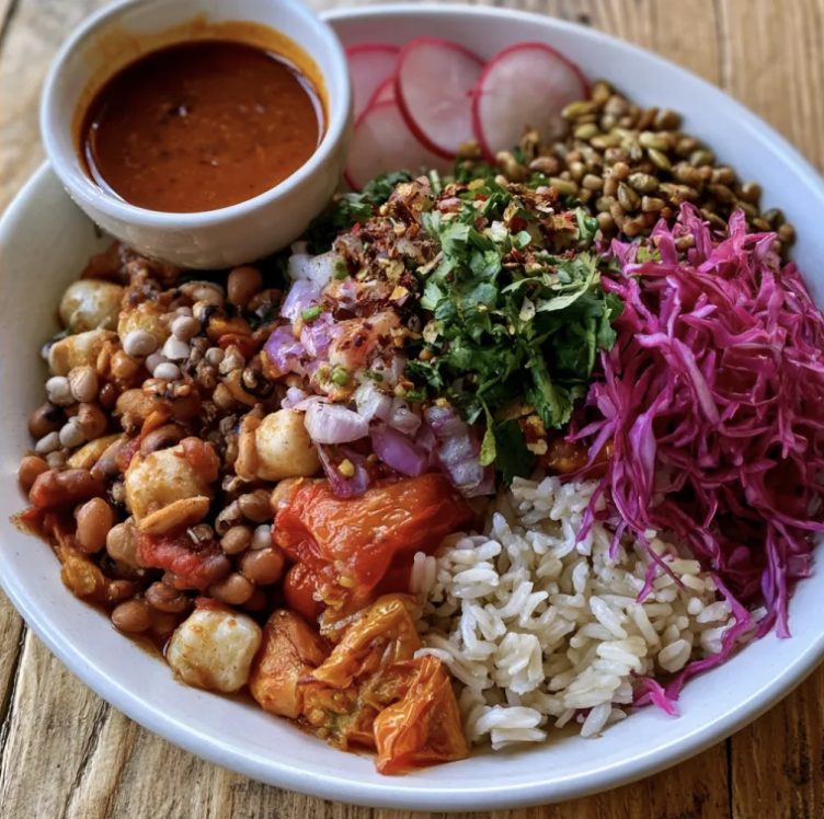 Fall Pozole Bowl with Mixed Beans & Hominy, Basmati Rice, Tomatoes, Red Cabbage, Roasted Diced Onions, Cilantro, Radish, Pepitas, Pozole Chile Broth