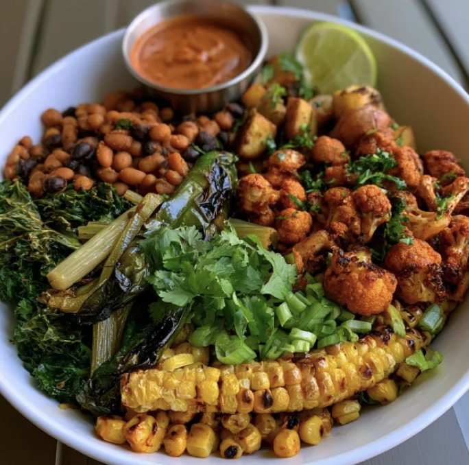 For Pros: Southwest Fiber Bowl with Mixed Bean Chili, Roasted Potato, Cauliflower, Braised Kale, Celery, Charred Poblano Pepper, Sweet Corn, Cilantro, Scallion, Lime, Smoky Poblano Sauce