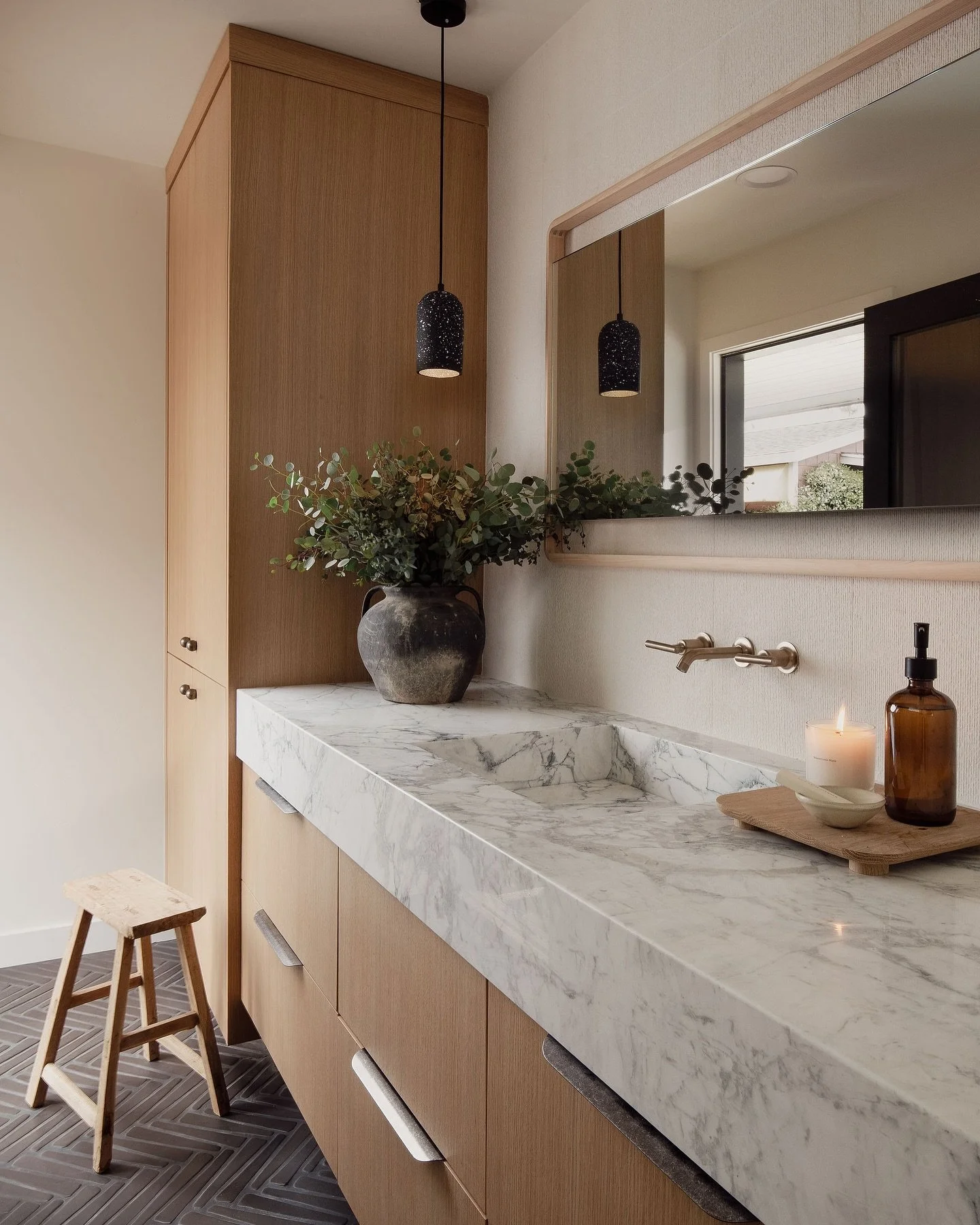 Perfectly paired marble + tile 🖤

Our studio bath. When designing this space, I wanted to make a statement while still keeping it refined and timeless. My goal was to show how we can be a little edgy and fun AND some of the different ways materials 