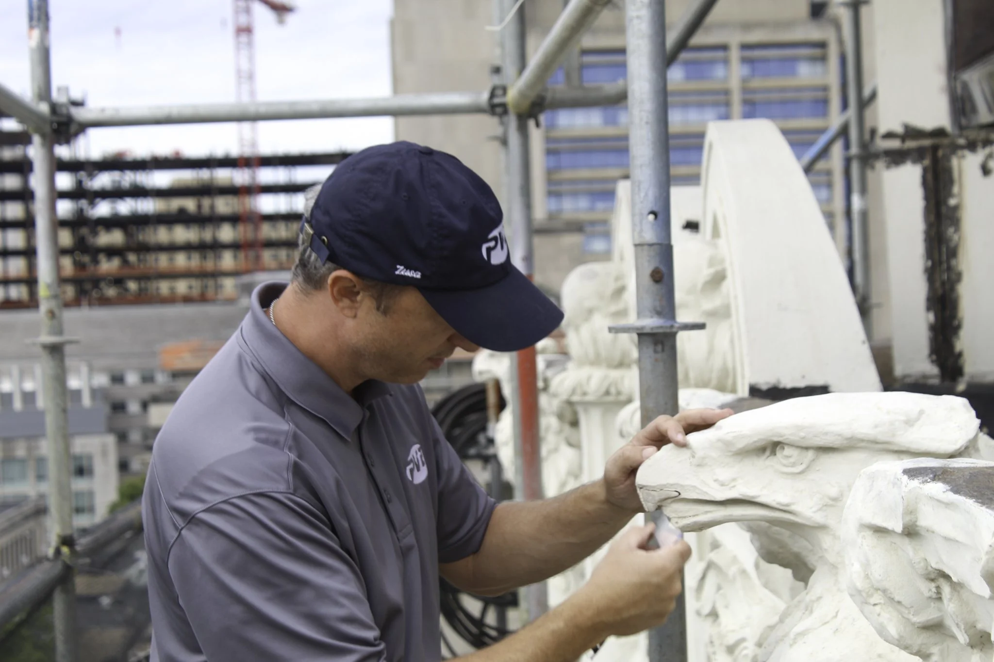 Engineer performing a facade inspection on Soldiers & Sailors Memorial Hall in Oakland.