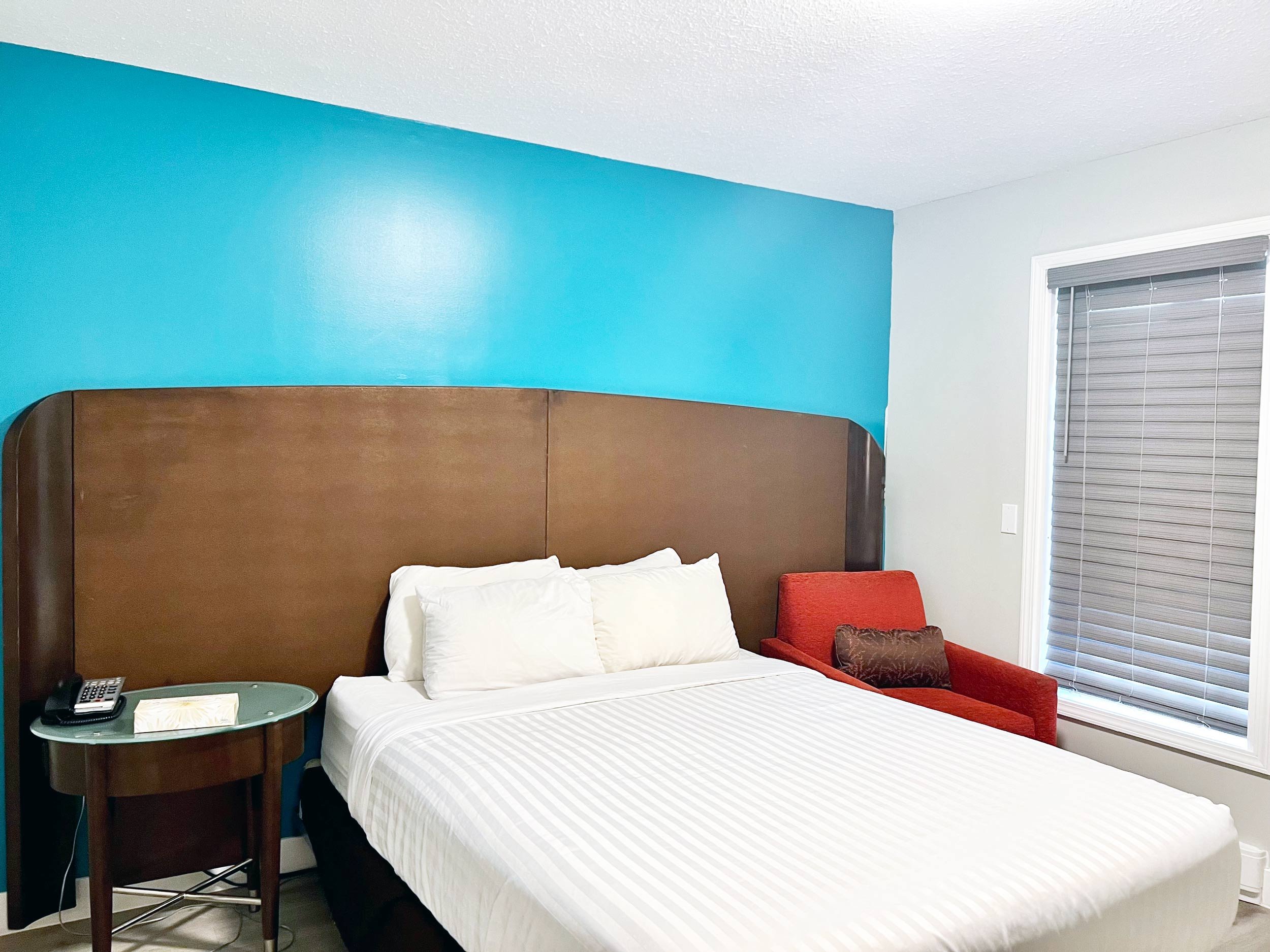  photo of room with one queen be at The Tide's Inn Hotel · Parksville BC 