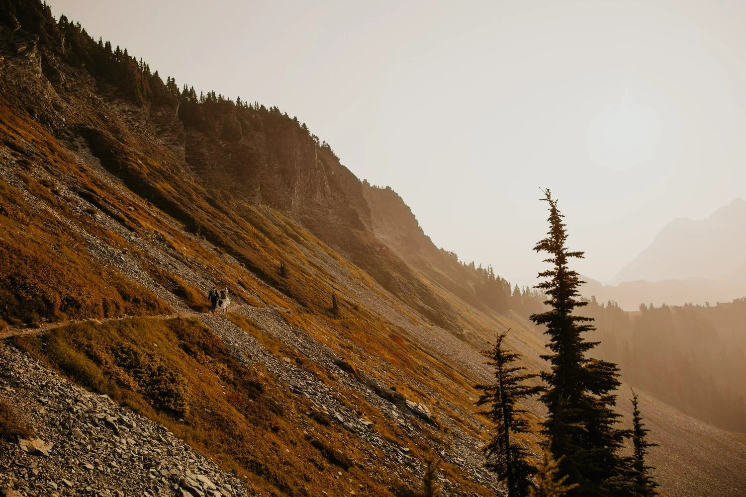 artist-point-hazy-trail-hikers-fall-color.jpg