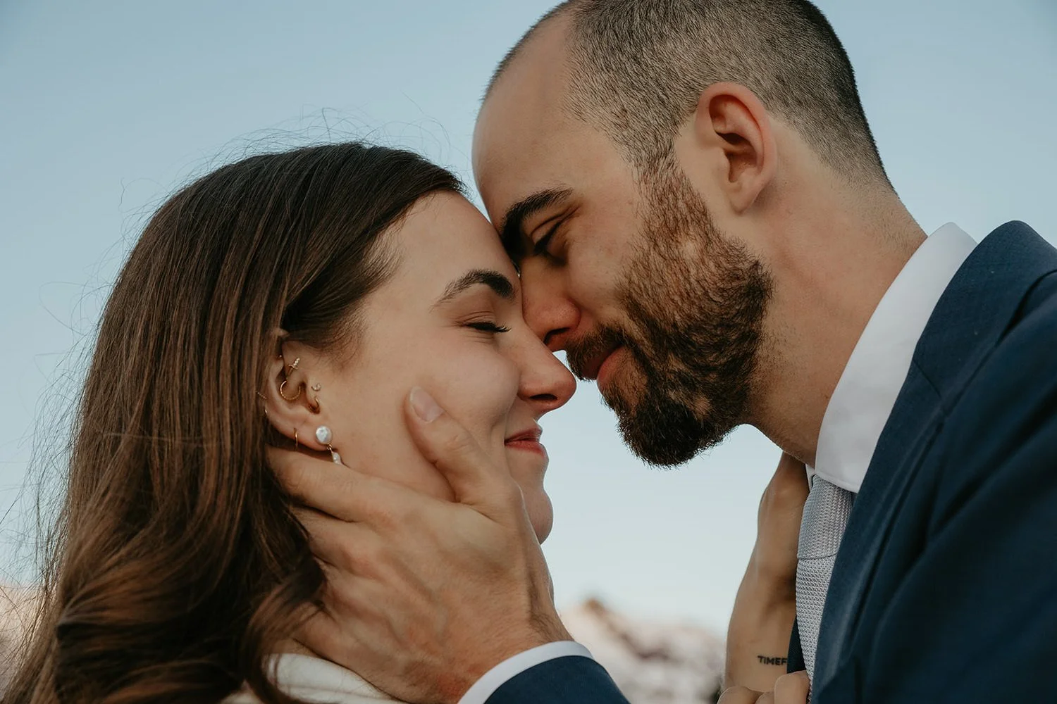 Close-up portrait of couple sharing an intimate moment during their Washington elopement.