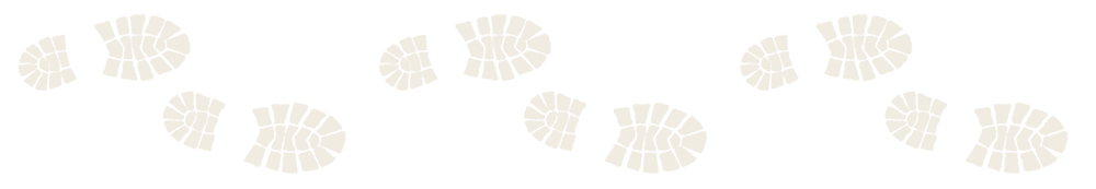 A repeating pattern of light-colored boot prints scattered across a deep green background.