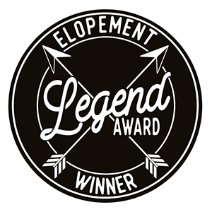 black circle with white text reading elopement legend award winner