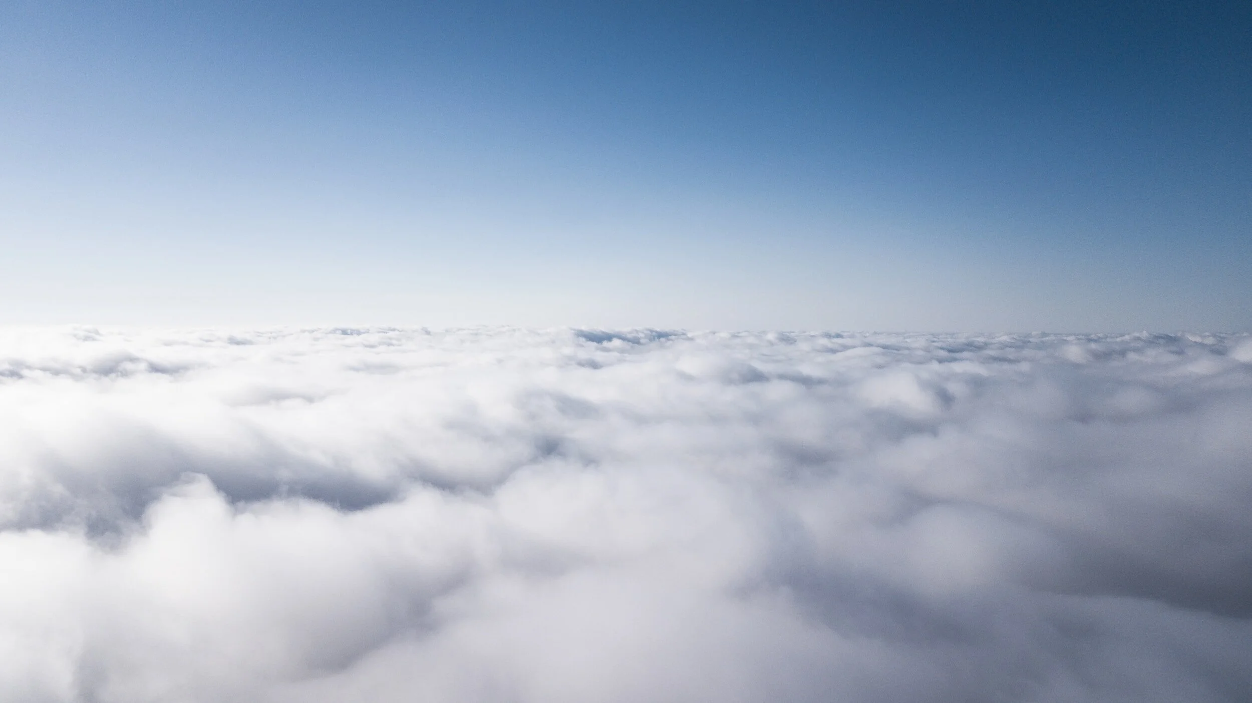 Cloudscape with blue sky above