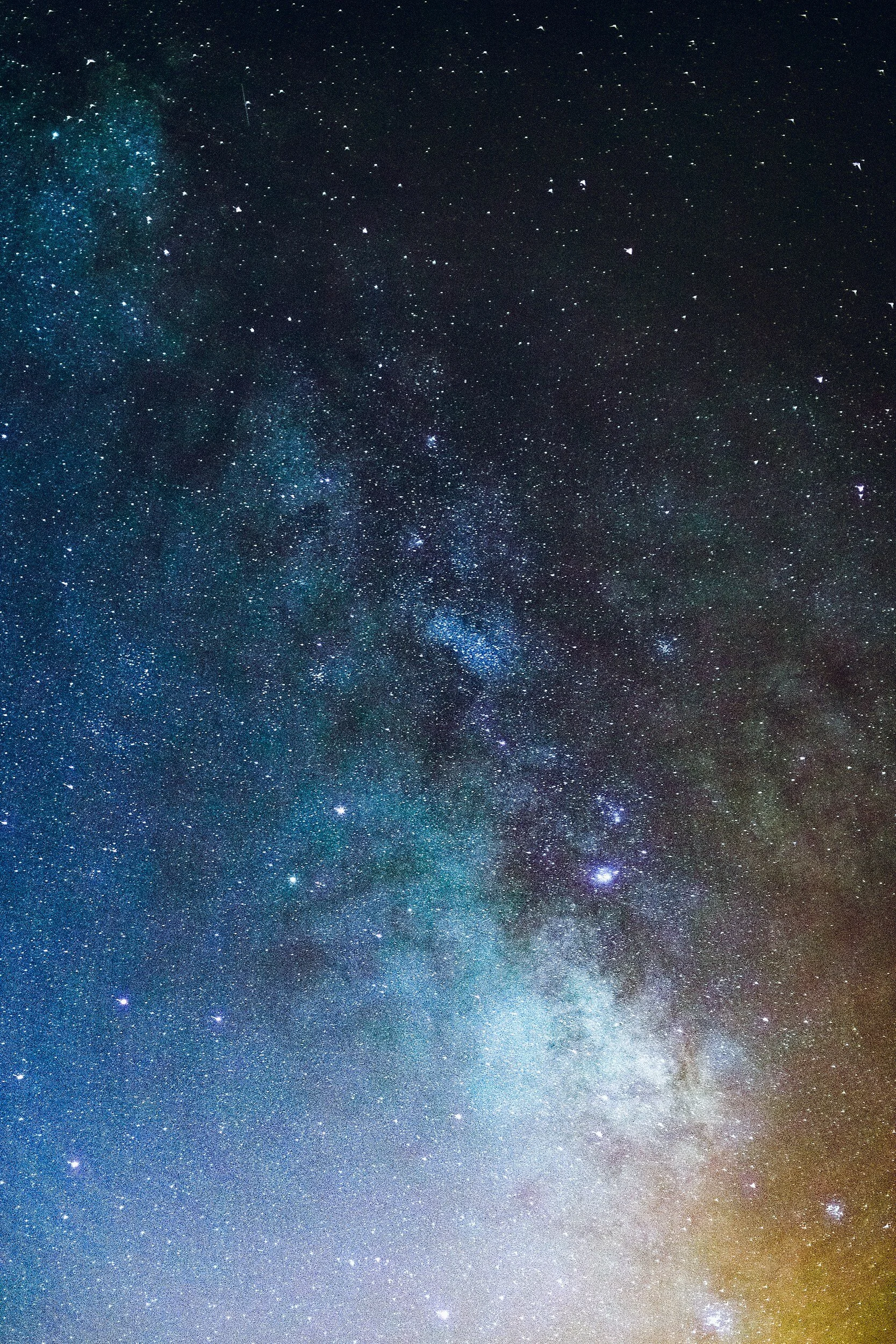 Night sky with stars and Milky Way galaxy visible.