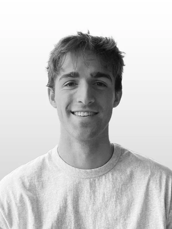 Greyscale portrait photo of Sam Wein